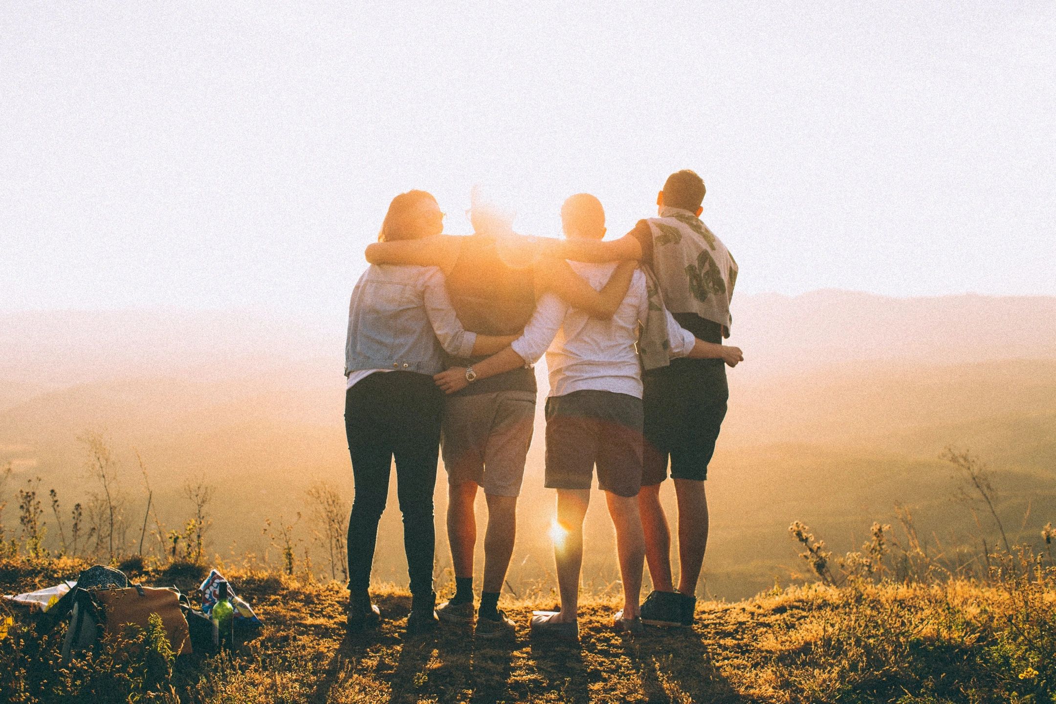 Group of people hugging to demonstrate the idea of consent